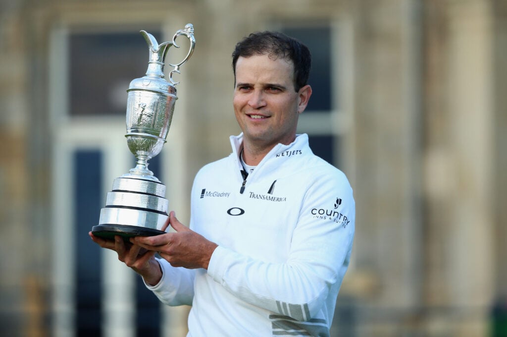 Zach Johnson of the United States holds the Claret Jug after winning the 144th Open Championship at The Old Course during a 4-hole playoff on July 20, 2015 in St Andrews