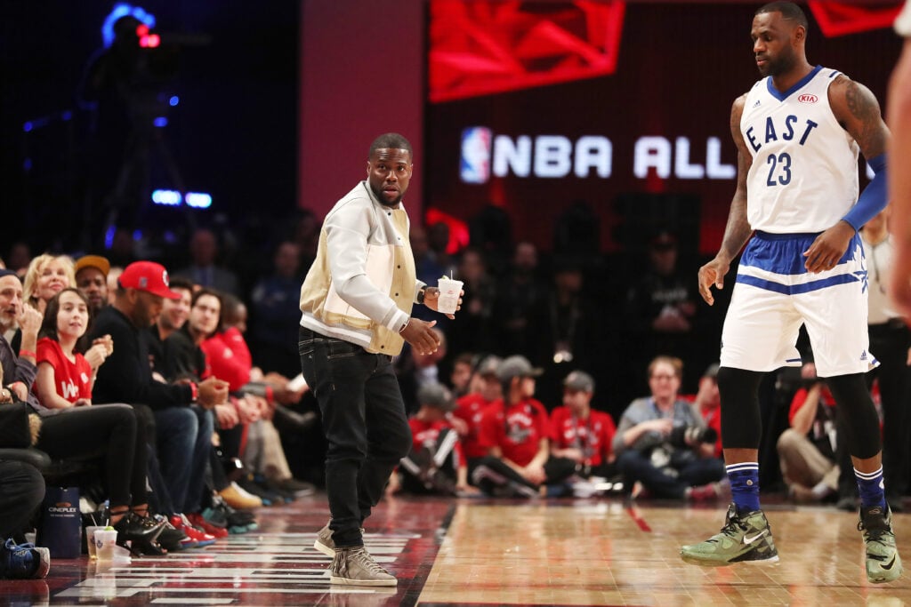 Kevin Hart will lose his drink to LeBron James who passes it onto Drake during the 65th NBA All-Star Game at the Air Canada Centre in Toronto. February 14, 2016.