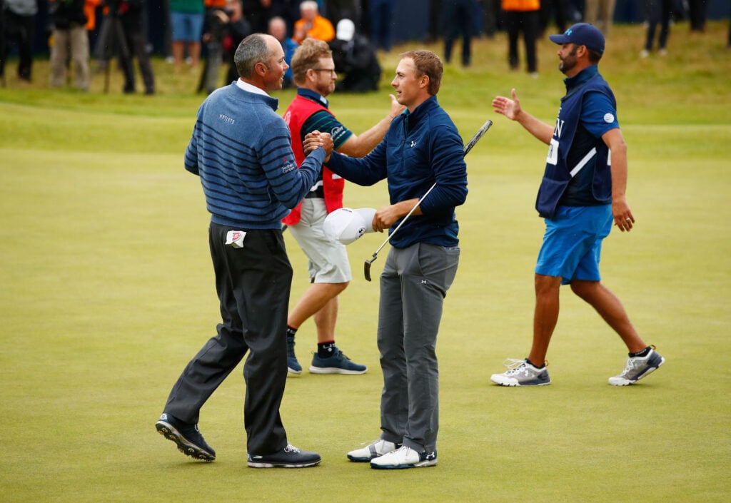 Jordan Spieth shakes hands with Matt Kuchar after the final round of the 2017 Open Championship