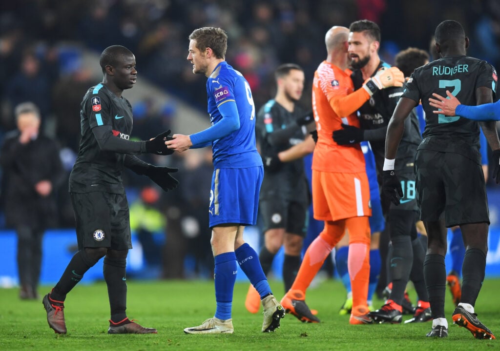 N'Golo Kante of Chelsea (L) and Jamie Vardy (2L) of Leicester City shake hands after The Emirates FA Cup Quarter Final match between Leicester City and Chelsea at The King Power Stadium.